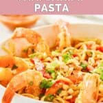 Closeup of homemade Planet Hollywood Thai shrimp pasta in a white bowl.