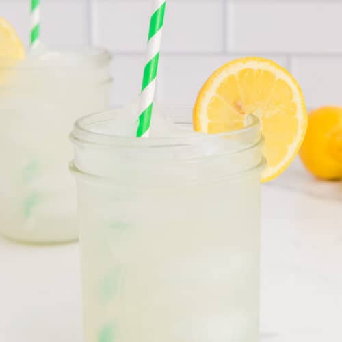 Copycat Starbucks lemonade garnished with a lemon slice.