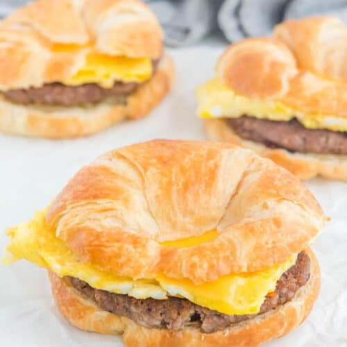 Three copycat Burger King sausage egg and cheese croissan'wich breakfast sandwiches.