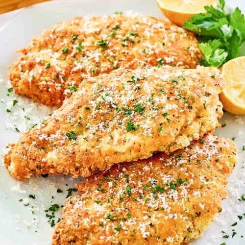 Copycat Luby's Italian chicken breast on a platter.