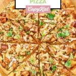 Overhead view of a sliced homemade CPK Thai chicken pizza.