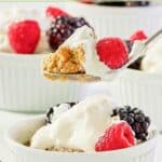 Homemade Brennan's oatmeal custard with whipped cream and berries on a spoon over a dish of it.