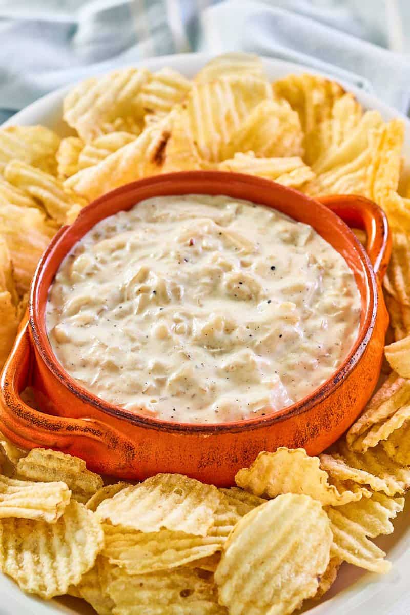 Ina Garten onion dip and thick-cut potato chips on a platter.