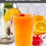 Homemade Applebee's Bahama Mama garnished with a cherry and orange slice.