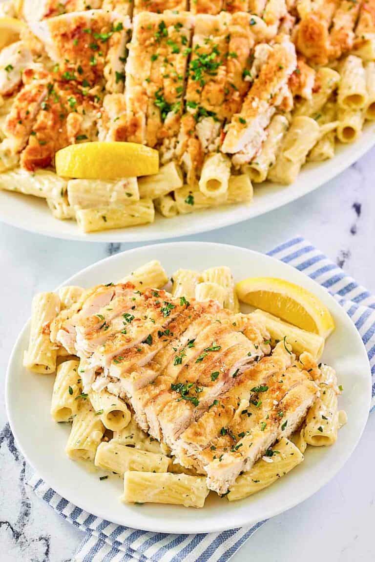Copycat Biltmore Estate gorgonzola chicken pasta on a platter and plate.