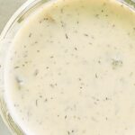 Closeup of dill pickle ranch dressing.
