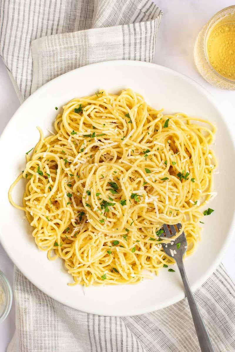 Overhead view of copycat Old Spaghetti Factory spaghetti with mizithra cheese and browned butter.