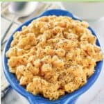 Homemade mac and cheese with black pepper sprinkled on top.