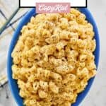 Homemade macaroni and cheese with black pepper sprinkled on top.