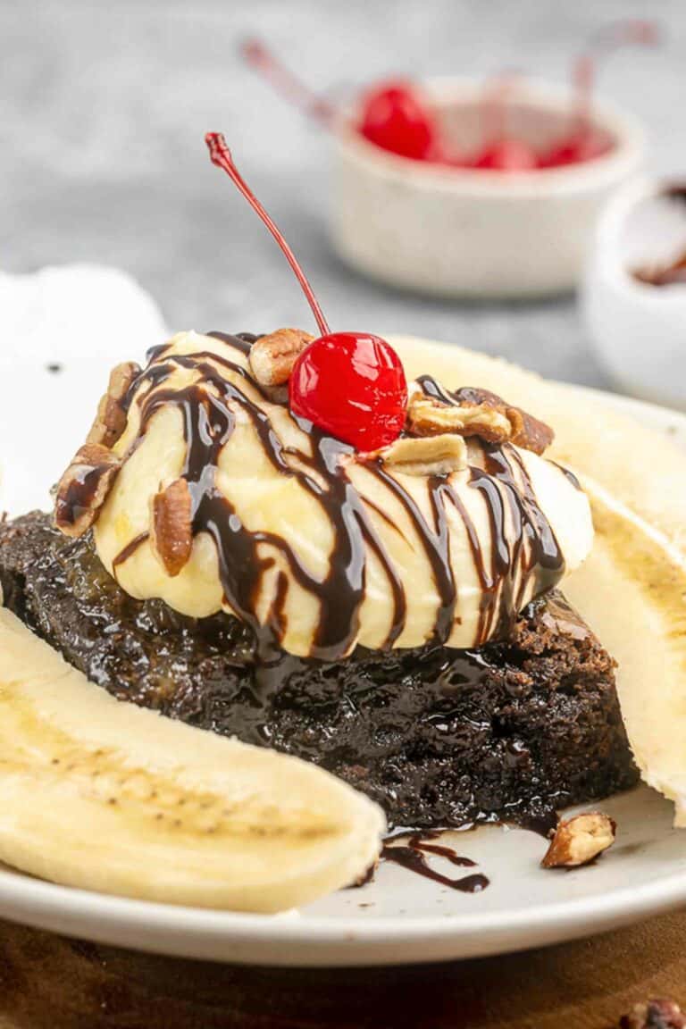 Copycat Olive Garden brownie banana funtastico and a bowl of cherries.