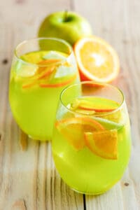 Copycat Olive Garden green apple moscato sangria in two glasses.