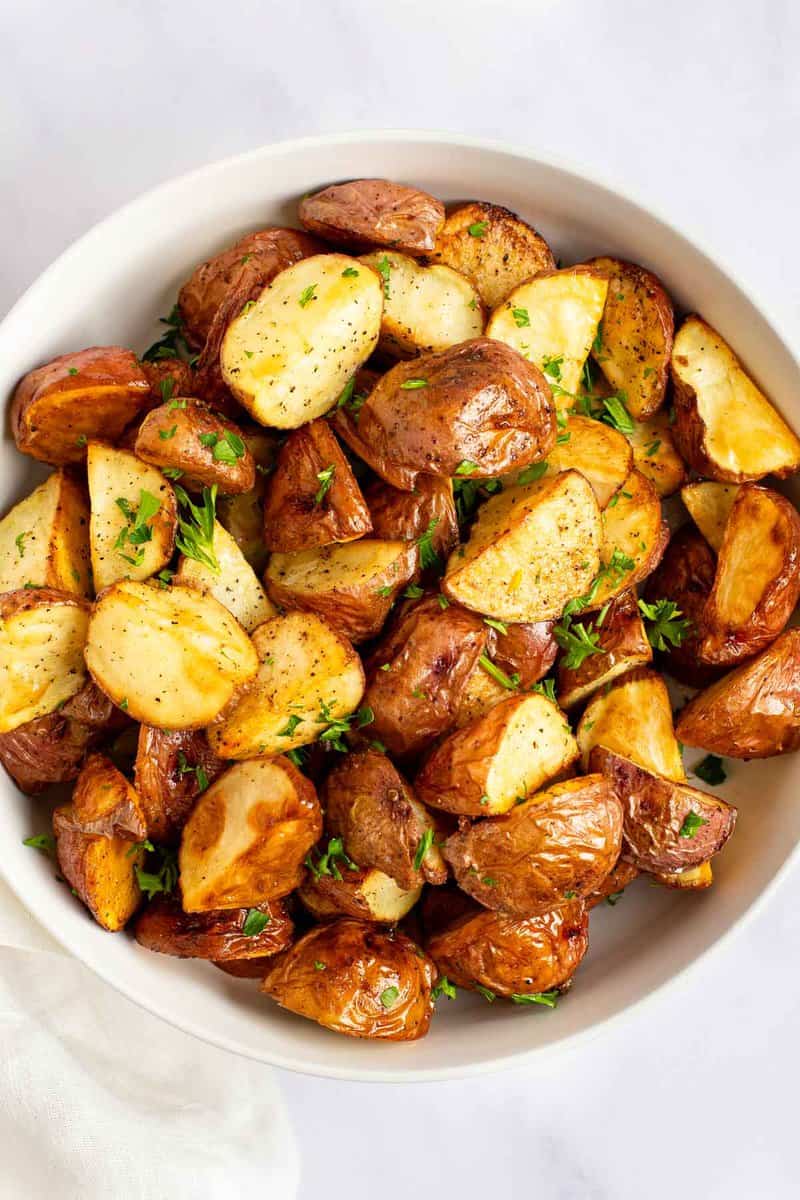 Roasted red potatoes in a bowl.