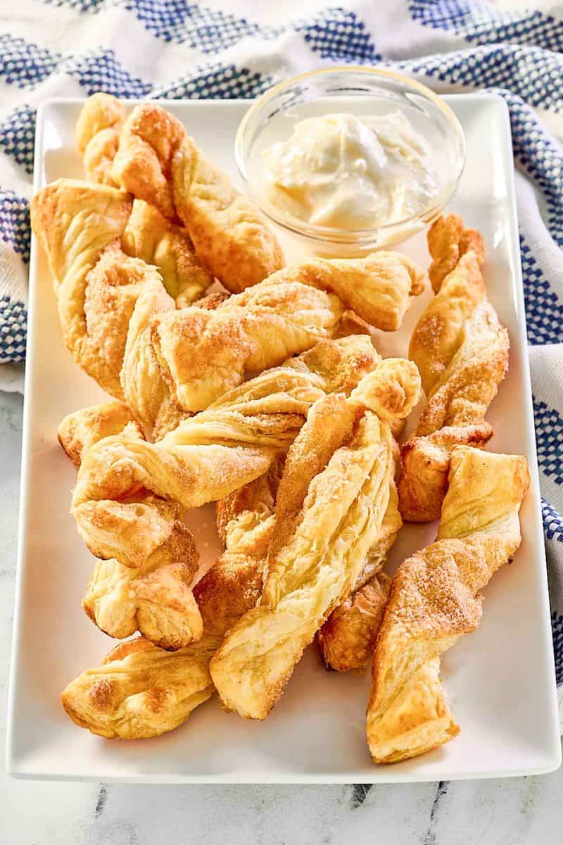 Copycat Cinnabon cinnamon sticks with cream cheese frosting dip.