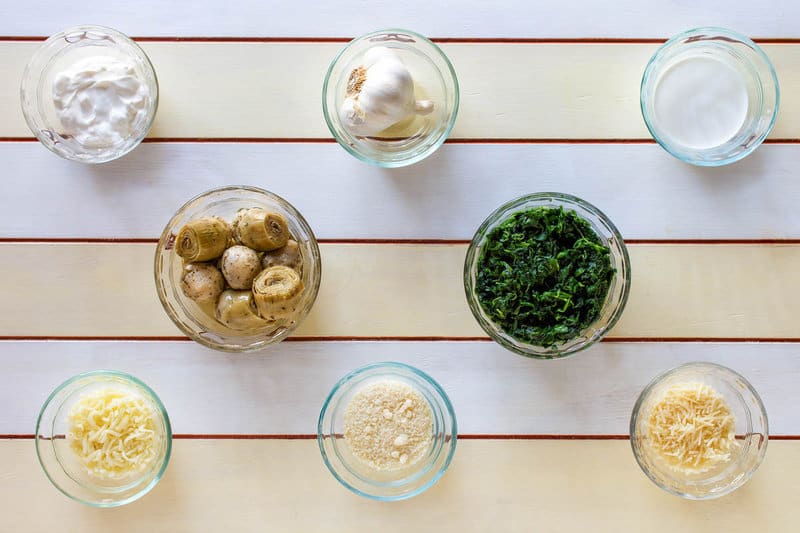 Copycat Houston's spinach artichoke spinach ingredients in bowls.