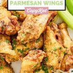 Homemade Wingstop garlic parmesan chicken wings and celery sticks.
