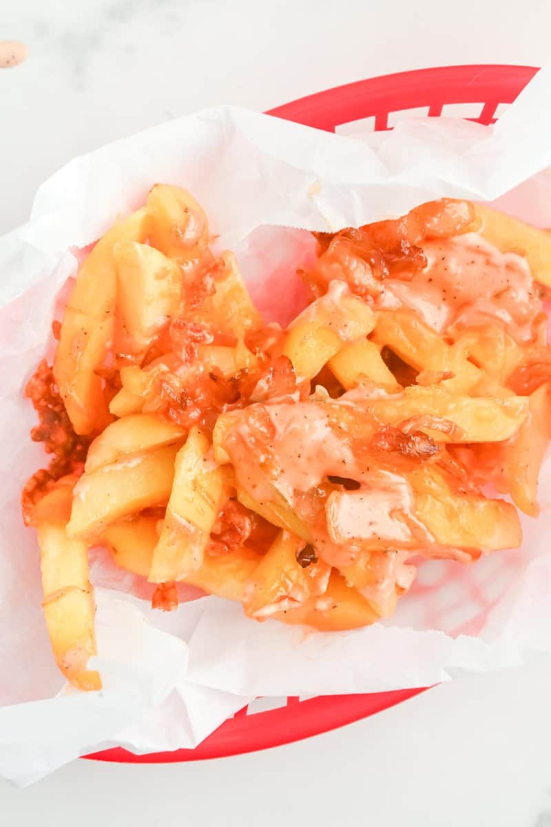 Copycat In-N-Out animal style fries in a serving basket.