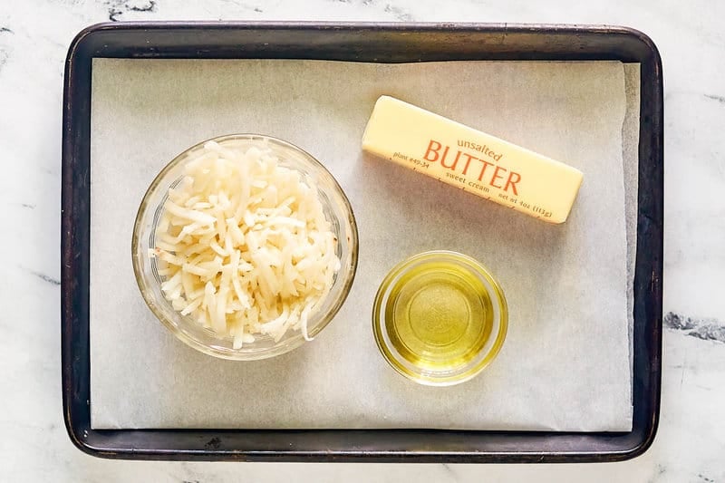 Copycat Waffle House hash browns ingredients on a tray.