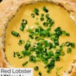 Homemade Red Lobster lobster and shrimp fondue dip in a bread bow.