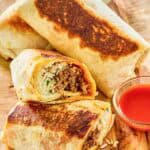 Copycat Taco Bell quesaritos on a wood board.