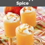 Homemade Starbucks caramel apple spice drink and three cinnamon sticks.