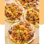 Four homemade taco villa mexican pizza things on a wood platter.