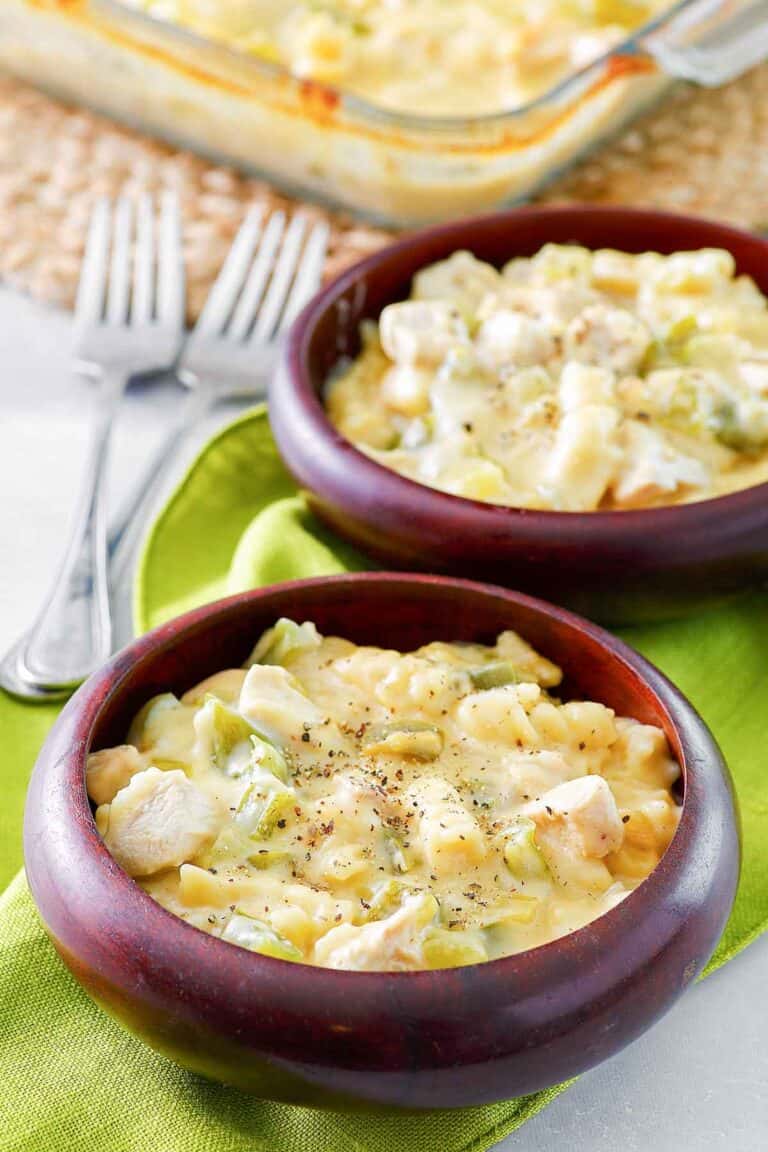 Everyday chicken casserole in a baking dish and two bowls.