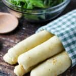 Homemade Olive Garden breadsticks and a green salad.