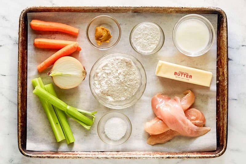 Copycat Cracker Barrel chicken and dumplings ingredients on a tray.