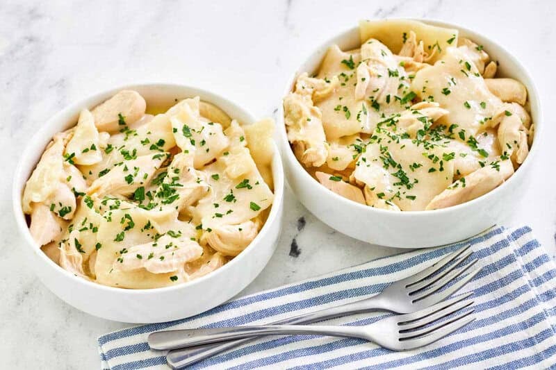 Two bowls of copycat Cracker Barrel chicken and dumplings.