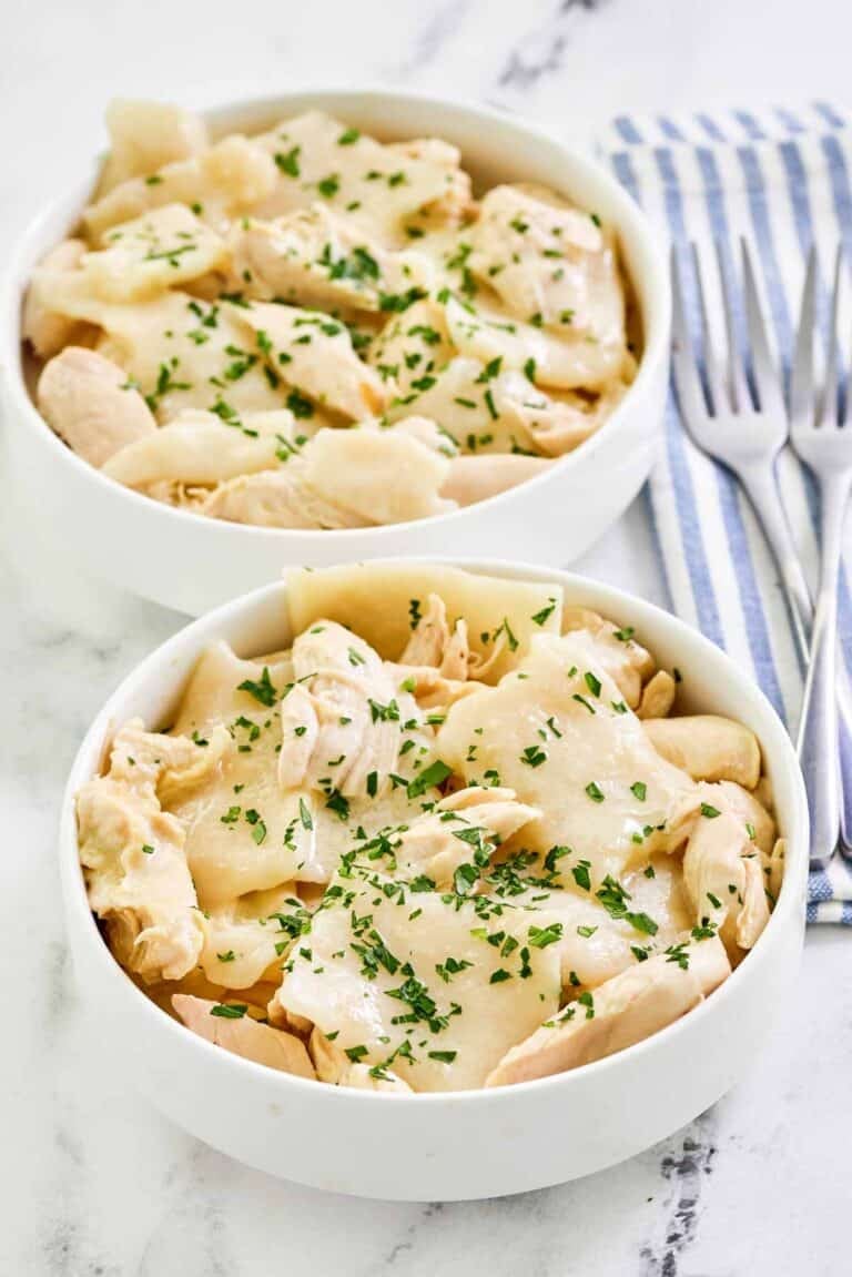 Copycat Cracker Barrel chicken and dumplings in two bowls.