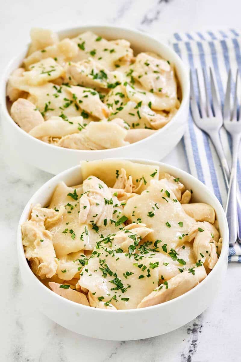 Copycat Cracker Barrel chicken and dumplings in two bowls.
