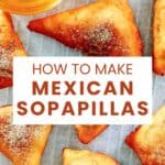 Homemade Mexican sopapillas on parchment paper.