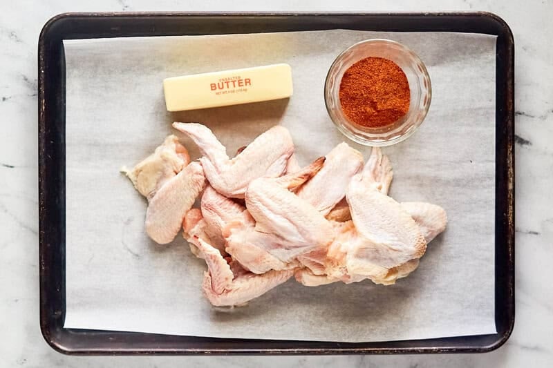 Copycat Wingstop Louisiana rub wings ingredients on a tray.