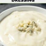 Homemade Simon & Seafort's blue cheese salad dressing in a small bowl.