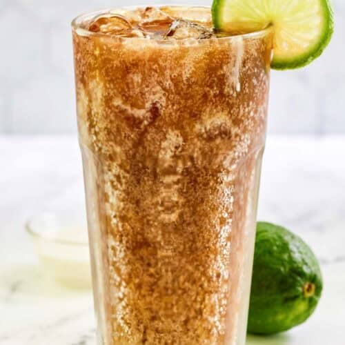 Copycat sonic dirty diet coke garnished with lime.