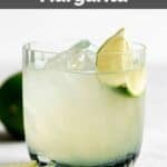 Homemade Chipotle Mexican Grill margarita on the rocks garnished with lime.
