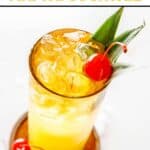 Homemade PF Chang's mai tai cocktail with a cherry.
