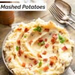 Homemade Ponderosa Steakhouse loaded mashed potatoes, forks, spoon, and salt.