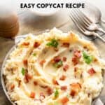 Homemade Ponderosa Steakhouse loaded mashed potatoes in a serving dish.