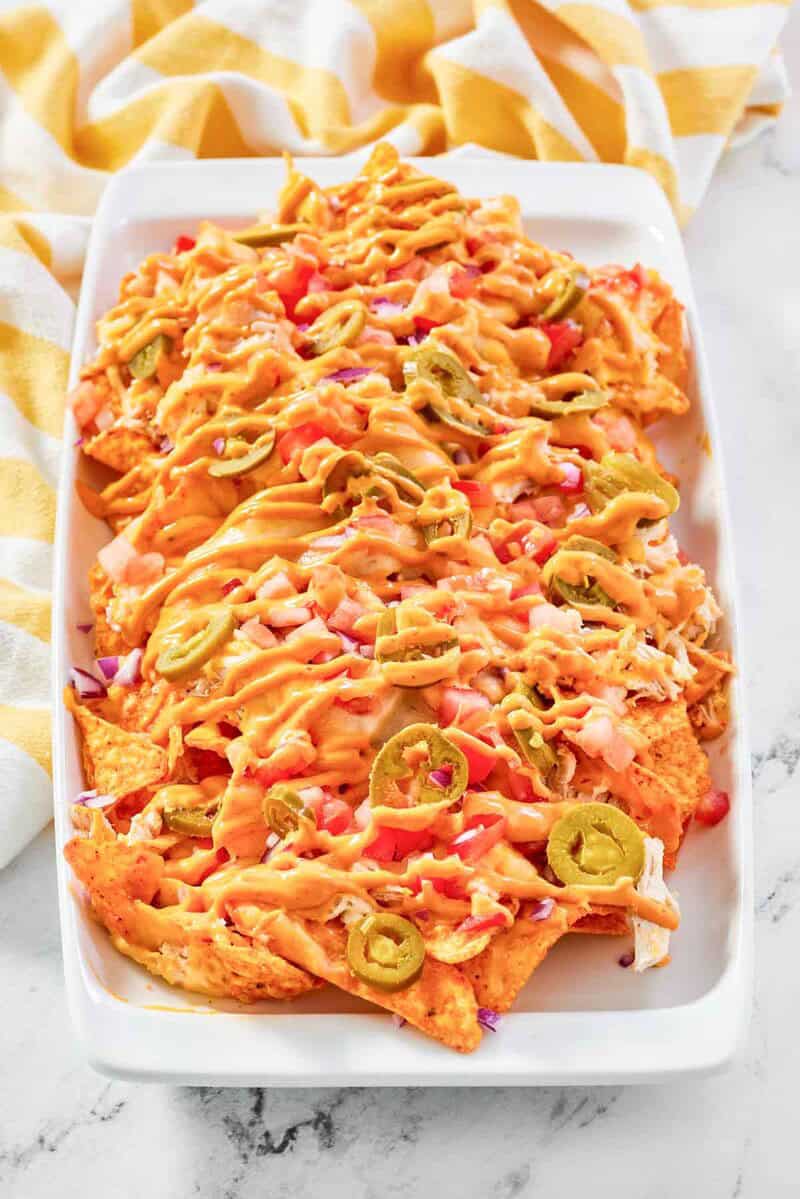 Copycat Subway Doritos footlong chicken nachos on a platter.
