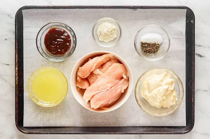 Copycat chicken salad chick barbie-q chicken salad ingredients on a tray.