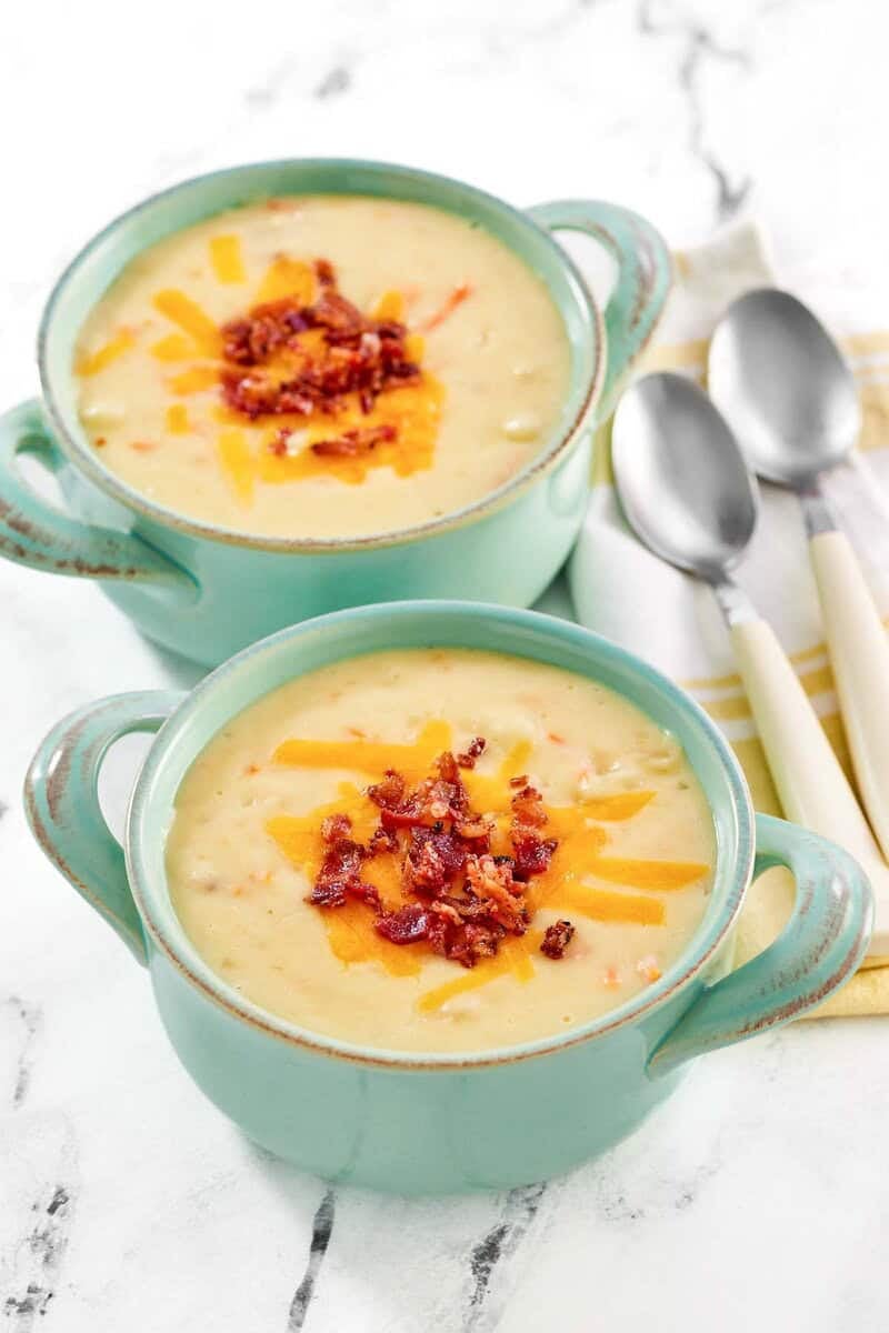 Copycat Jason's Deli Irish potato soup in two soup crocks.