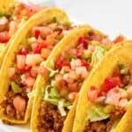 Homemade taco bell crunchy fresco style tacos on a platter.