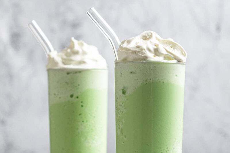 Copycat Starbucks matcha green tea frappuccino drinks with straws.