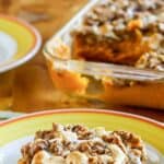 Copycat Boston Market sweet potato casserole in a glass baking dish and on a plate.