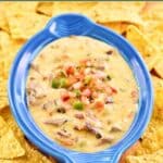 Homemade H-E-B brisket queso dip served with tortilla chips.