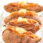 Homemade Outback Steakhouse baked sweet potatoes with honey butter and brown sugar.