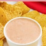 Homemade Chipotle adobo ranch in a small bowl and tortilla chips behind it.
