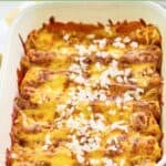 Homemade El Chico cheese enchiladas with chopped onions sprinkled on top.