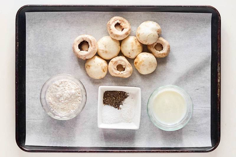 Copycat Fat Ronnie's deep fried mushrooms ingredients on a tray.